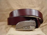 burgundy leather belt with belt buckle knife